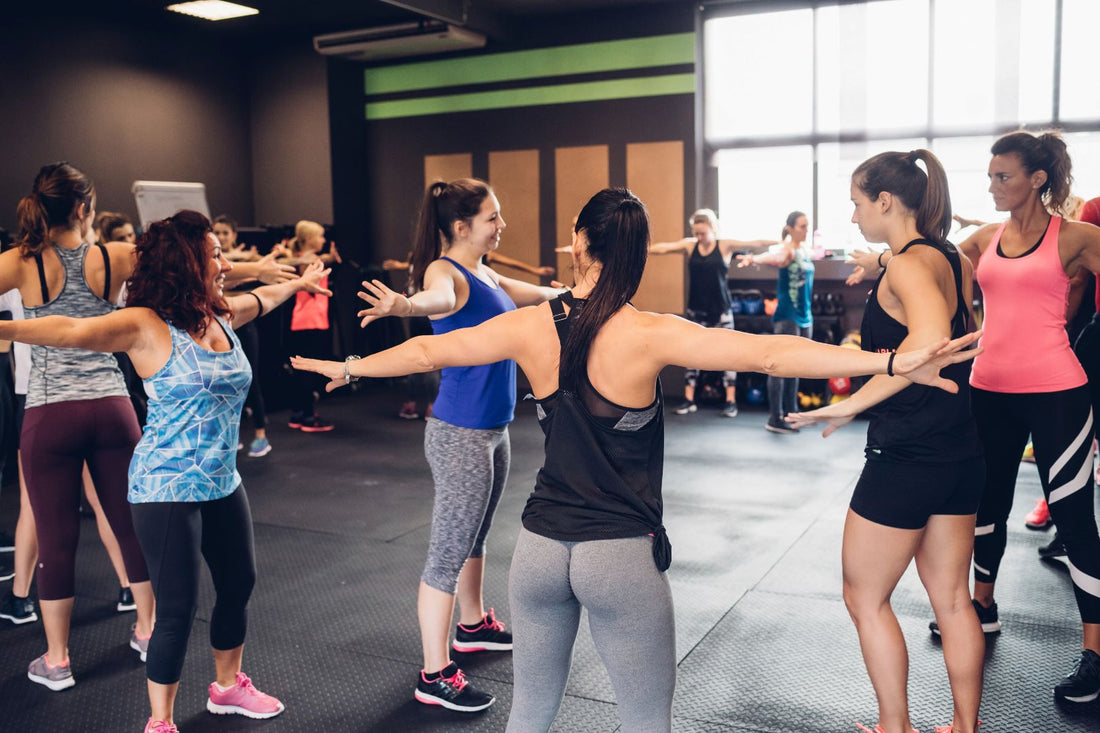 ConvertOut-Resized-group-of-women-training-in-gym-with-arms-outstret-2024-07-03-01-26-31-utc.jpg