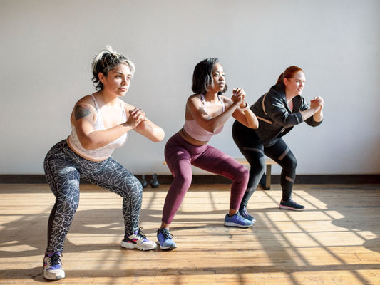 ConvertOut-Resized-women-doing-squats-in-fitness-class-2023-11-27-05-31-33-utc.jpg