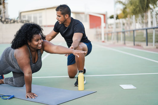 ConvertOut-Resized-african-curvy-woman-and-personal-trainer-doing-pil-2023-11-27-05-04-04-utc.jpg