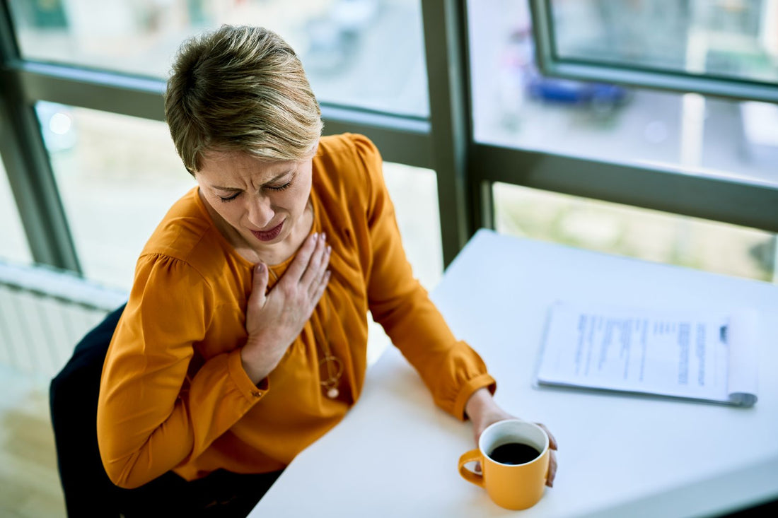 ConvertOut-Resized-young-businesswoman-coughing-while-drinking-coffee-2023-11-27-05-16-54-utc.jpg